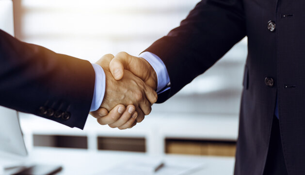 businessmen handshake - business meeting and partnership concept copy space