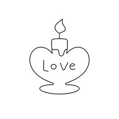 A candle in a heart shape with the word LOVE written on it