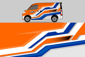 Dynamic Orange and Blue Vehicle Wrap Design for Van