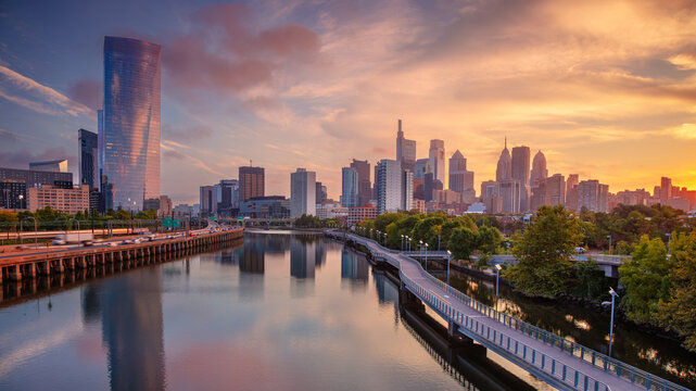 Philadelphia, Pennsylvania, USA. Cityscape image of downtown Philadelphia, Pennsylvania and Schuylkill River leading to the city at beautiful autumn sunrise. - Powered by Adobe