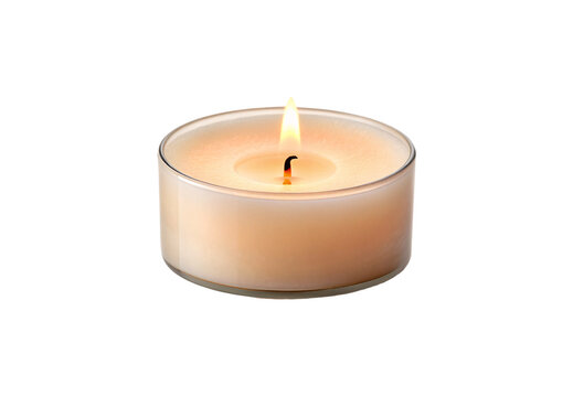 Lit tealight candle, warm flame, cream colored wax, glass holder, peaceful ambiance, isolated on a transparent background