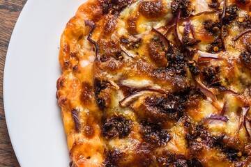 Deliciously toasted pizza with caramelized onions and melted cheese