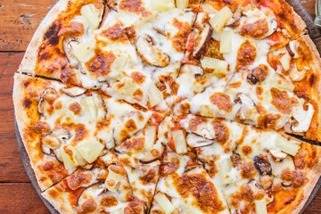 Deliciously topped pizza with melted cheese and savory ingredients
