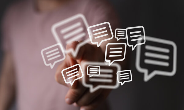 Abstract image of a hand interacting with a series of floating speech bubbles, representing communication, message, digital interaction and soci - Powered by Adobe