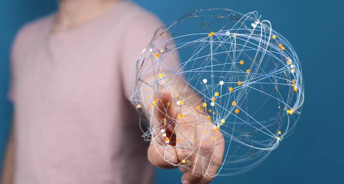 Close up of person holding digital network globe showing connections and data transfer. Concept of globalization technology and communication. - Powered by Adobe