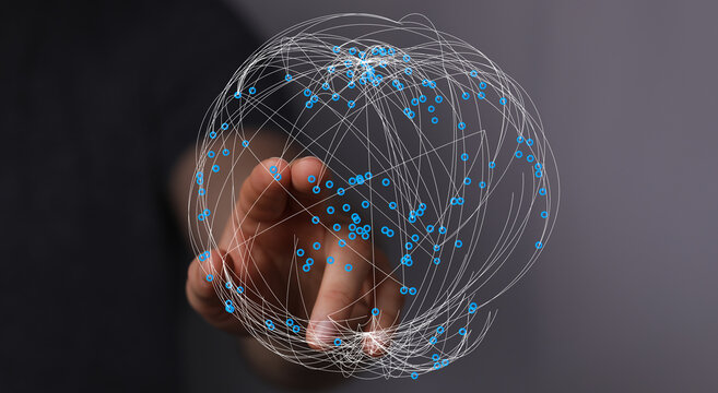 Visualize global network connection through a hand touching a digital sphere with connected nodes. Represents technology, data, and i