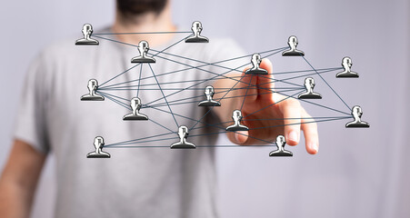Abstract image representing interconnectedness, networking, and human interaction. A hand interacting with a digital network, conveying concepts