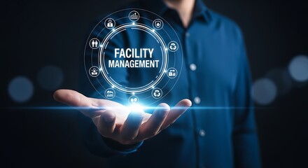 Man holding facility management digital interface with icons in palm building operations