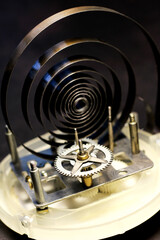 Fototapeta premium Retro mechanical watch mechanism, gears and metal parts.