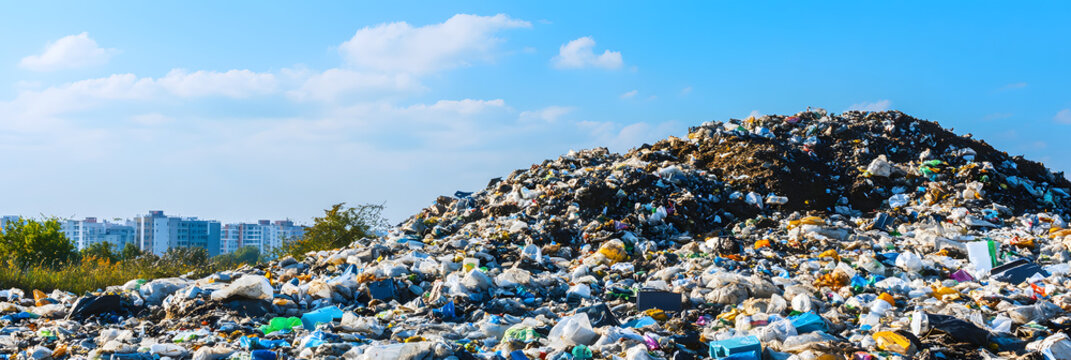 Large Urban Landfill Heap with Plastic Waste near City