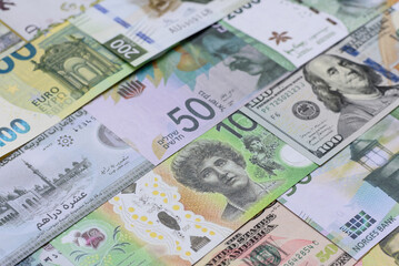 Money background, currency, paper banknotes from different countries. Money cash currency, green