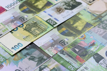 Money background, currency, paper banknotes from different countries. Money cash currency, green