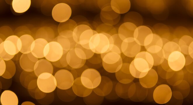 Abstract golden bokeh lights background with a soft focus effect, creating a warm and magical ambiance for festive occasions - Powered by Adobe