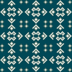 A geometric patterned design featuring intricate shapes in white and muted tones against a teal background.
