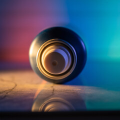 Obraz premium Close-up of Aerosol Spray Can Top Mockup with Neon Blue and Pink Light
