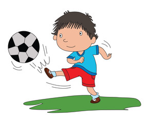 little boy kicking the football