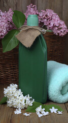  Close-up photography of green detergent bottle with plant label, natural product, shallow depth of field, bright natural light, clean background, copy space for text, eco-friendly concept, profession