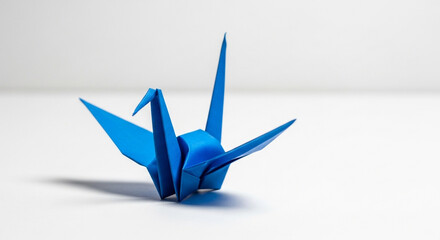 Origami crane isolated on white background, a symbol of peace and hope