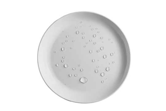 White ceramic plate with water droplets isolated on transparent background. Clean white ceramic plate with scattered water droplets isolated on white background.