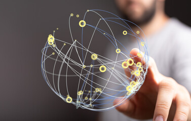 Close-up of a person's hand holding a glowing digital network globe, symbolizing global connection,...