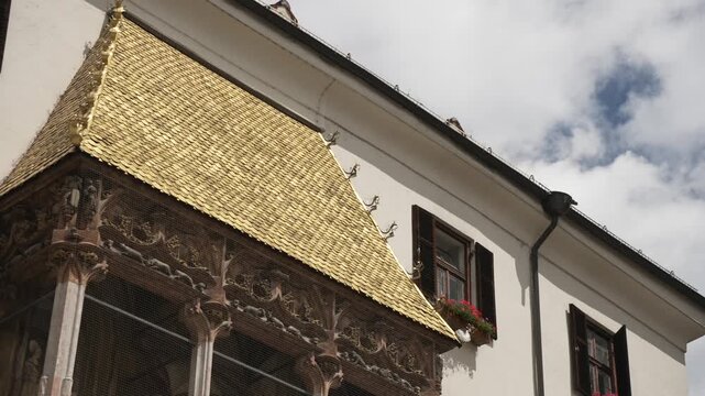 View of Golden Roof (Goldenes Dachl) in Herzog-Friedrich-Strasse on a sunny day, Innsbruck, Tyrol, Austria, Europe