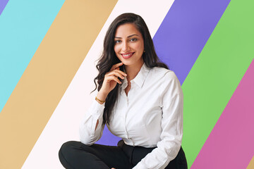  Portrait of beautyful and confident business woman, isolated colorful background.