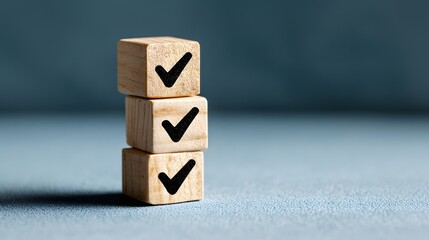 Checklist Complete concept.  Three Stacked Wooden Blocks with Checkmarks. Wooden alphabet blocks symbolize a raw concept of education or business learning