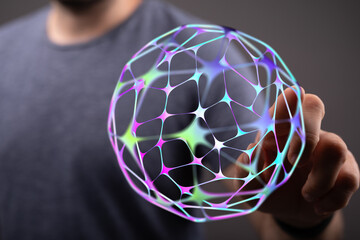 Abstract image depicting a hand holding a glowing network sphere. Perfect for illustrating concepts...