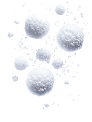 Collection of small to large snow balls and ice balls airborne on transparent background