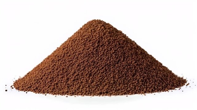 A perfectly formed conical pile of dark brown granular powder sits isolated against a clean white background. The textured surface of the fine particles is clearly visible, highlighting the rich, eart