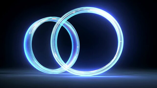 Two glowing blue interlocking rings with a subtle gradient on a dark, reflective surface