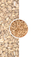 Half-frame composition of rolled oats and wooden bowl - natural breakfast concept.