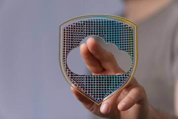 Abstract illustration of a digital cloud shield representing data security, technology, and protection. Ideal for articles about clou