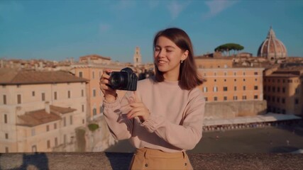 A young girl is vlogging with her camera in Rome, Italy