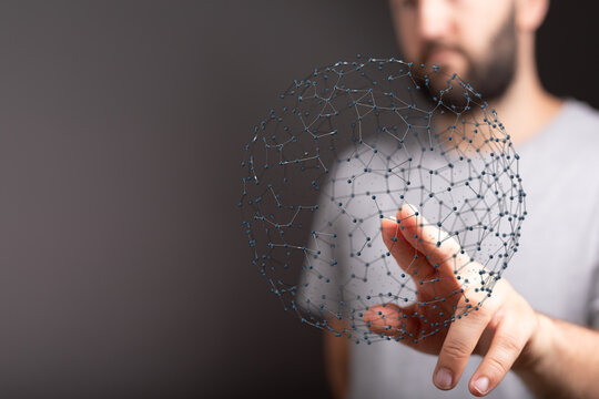 A man's hand touching a digital sphere representing connection, communication, and technology. Ideal for illustrating innovation and data.