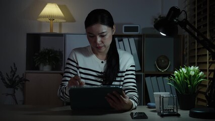 happy woman working with digital tablet at night - Powered by Adobe