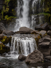 waterfall in mountains in Iceland