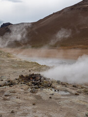 mountains and geysers in Hverir in Iceland