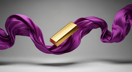 Golden bar with purple silk floating on gray background studio shot