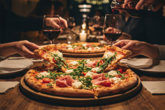 Friends sharing pizza and red wine in a cozy restaurant with warm lighting, representing friendship, celebration, and Italian dining atmosphere - Powered by Adobe
