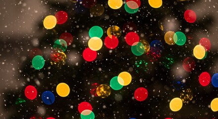 A closeup view of a decorated christmas tree with colorful bokeh lights and falling snow, creating a magical and festive holiday atmosphere