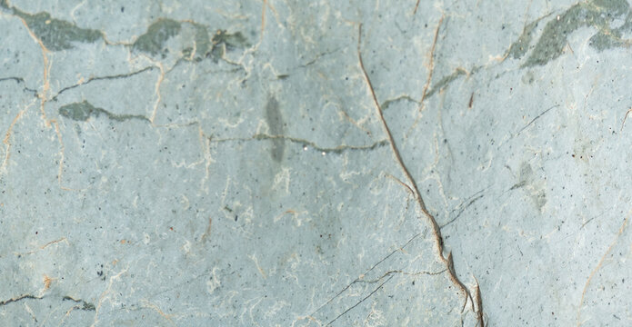 Textura de roca gris con grietas naturales y detalles org&aacute;nicos