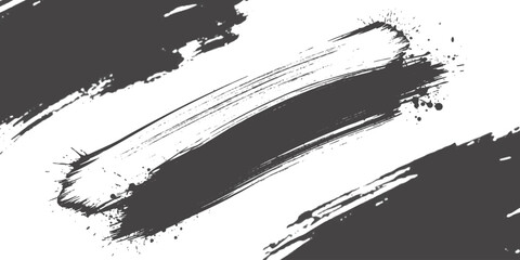 Black brush strokes with paint splatter on white background, grunge isolated on white background