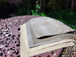 A pile of sandpapers at garden