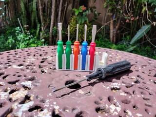 Screwdriver and bit kit at garden