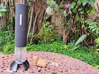 Wine Opener with wine corks at garden 