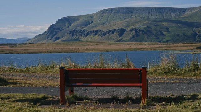 Red Bench with Mount Esja View Iceland