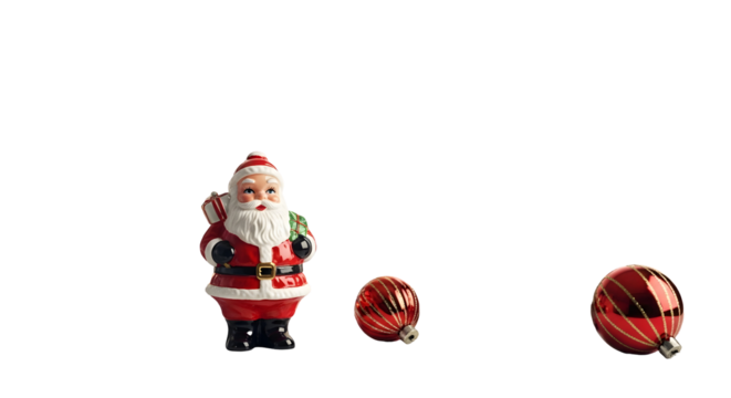 Santa Claus figurine with red baubles on a white background