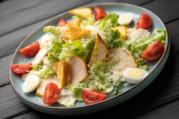 Caesar Salad with creamy, crunchy croutons and shaved Parmesan