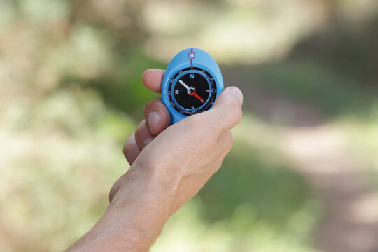 close up of a compass in the hand